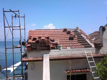 Removing old roof and creating new terrace sitting area